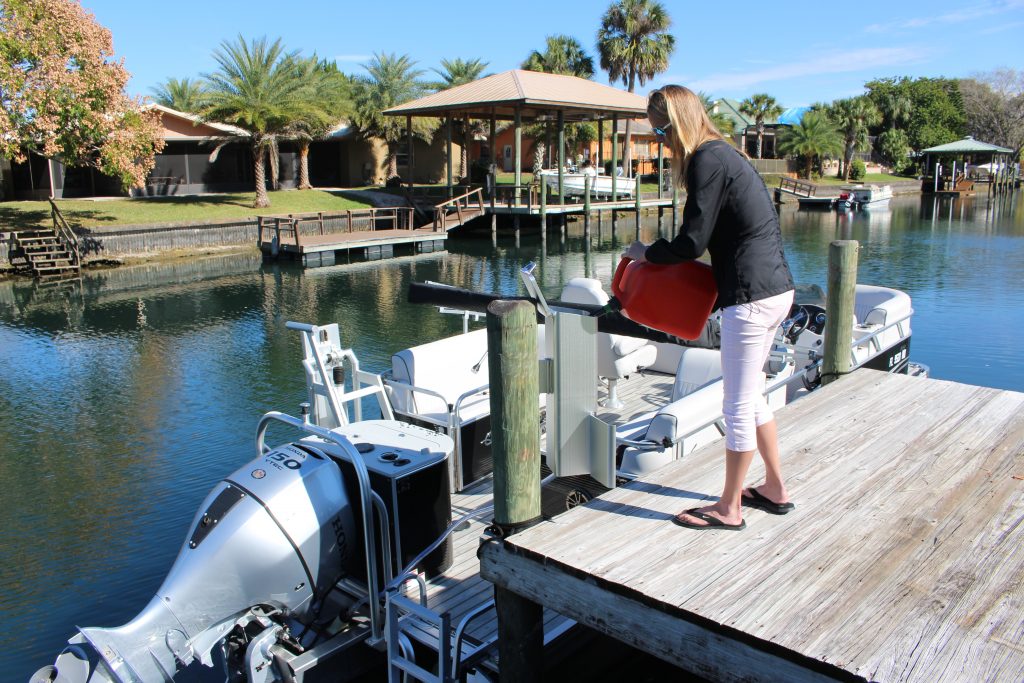 Ann Schaub refueling a PWC dockside with the LilliPad Marine Funnel