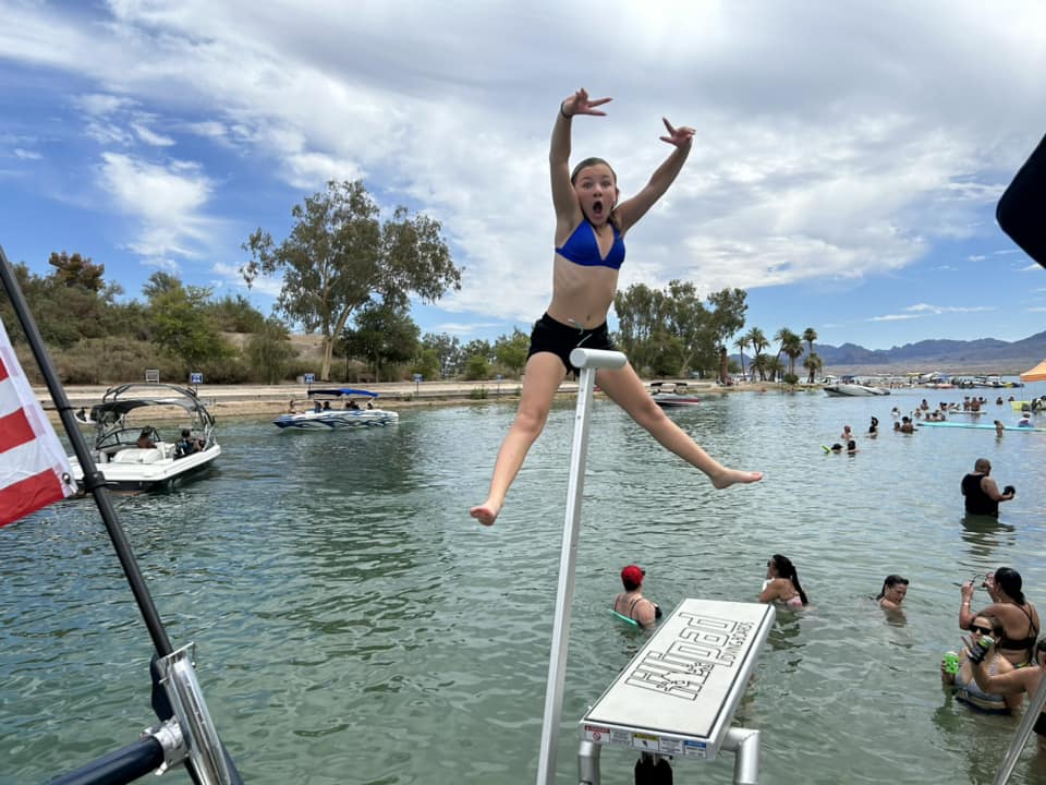 Family enjoying their pontoon boat upgraded with LilliPad Marine accessories, creating lasting memories on the water